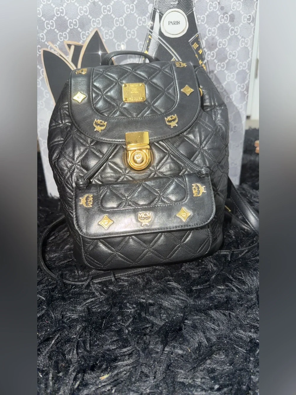 MCM Black Quilted Leather Backpack with Gold Hardware Accents